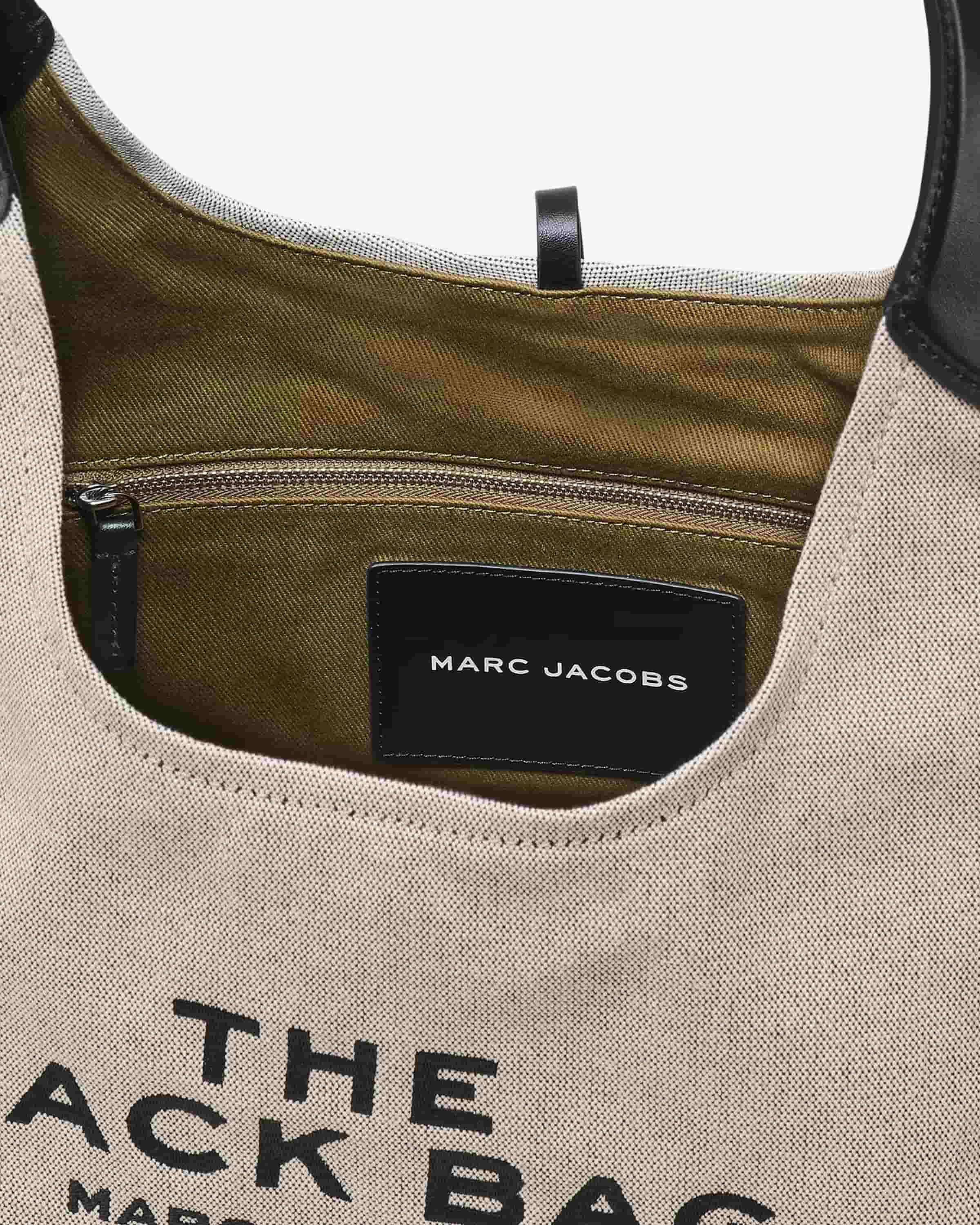 The Leather-Trim Canvas Belted Sack Bag - Image 4